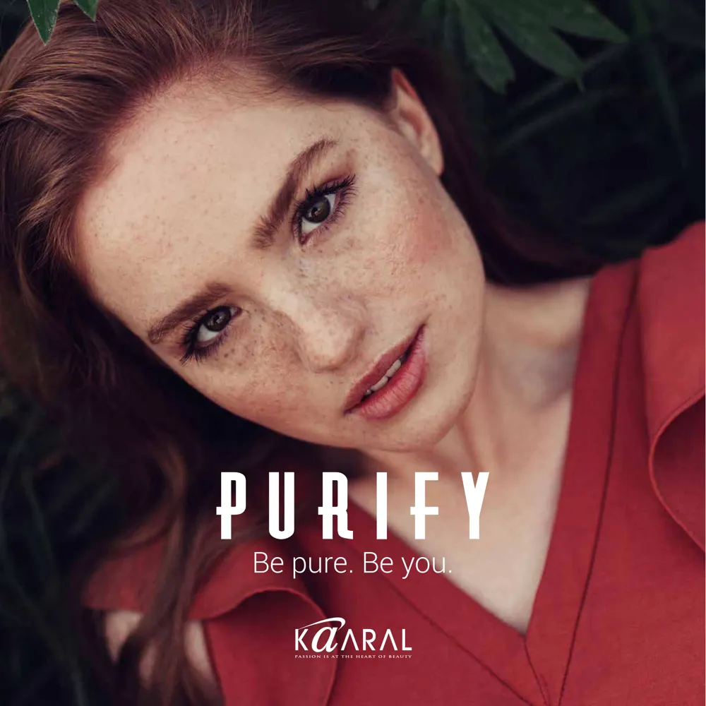 Model with glossy auburn colour-treated hair from the Purify by Kaaral range